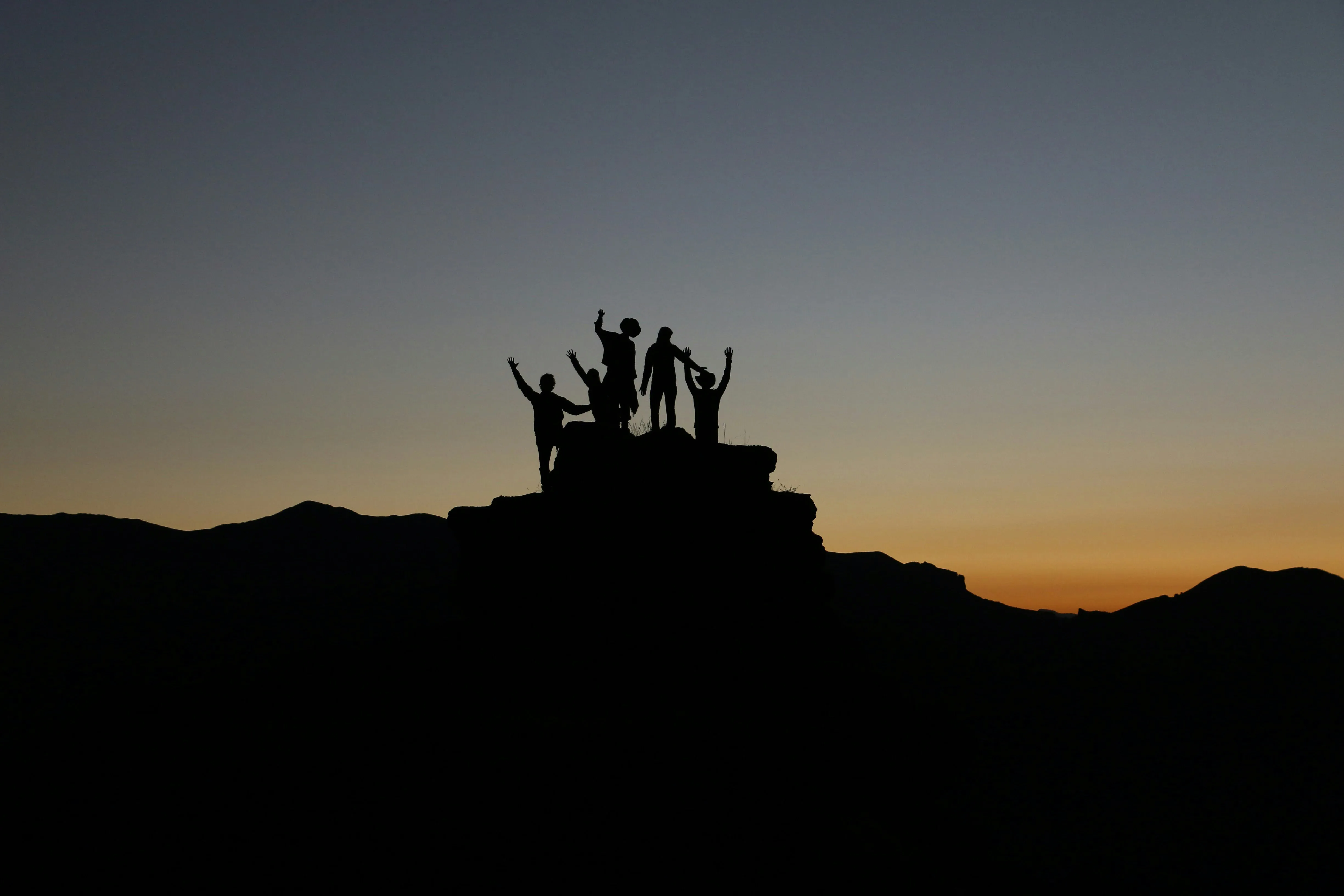 Group sharing a sunset experience in Morocco